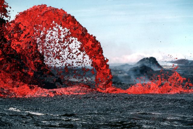 Kilauea drips lava int the ocean at Hawaii
