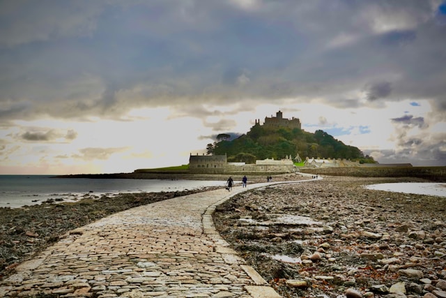The receding tide reveals the ocean causeway to St Michael's Mount