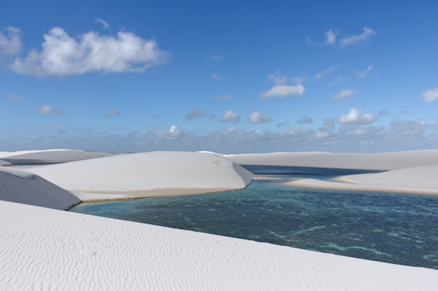 A blue lagoon amidst the white dunes of Lençóis Maranhenses