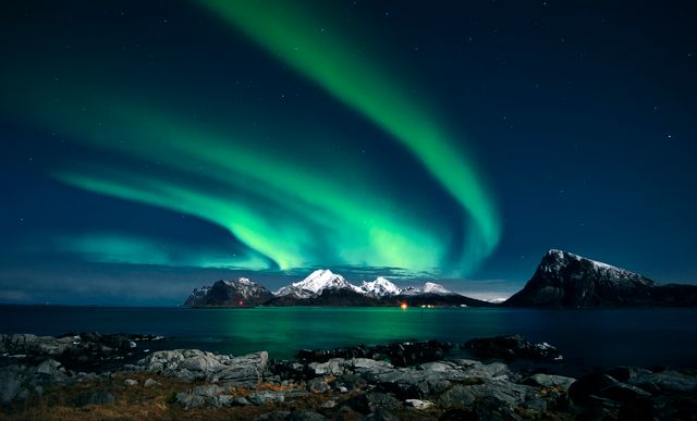 Winter night landscape with forest and polar northern lights, Swedish Lapland, Finnish Lapland