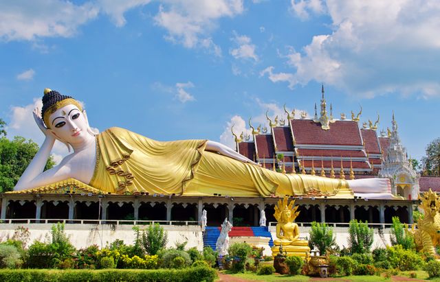 Reclining Buddha statue at Wat Pha That Luang in Vientiane, Laos.