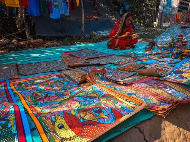 Colourful handicrafts being prepared for sale at Pingla village, West Bengal, India