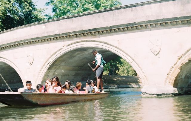 Punting on the River Cam near Clare Bridge, Cambridge