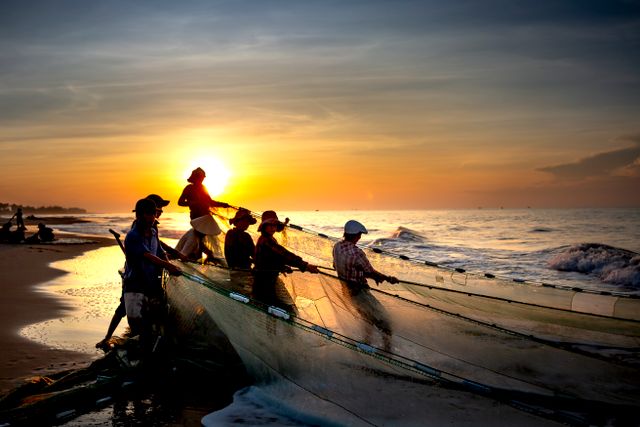 fishermen at work on the beaches of Lakshadweep