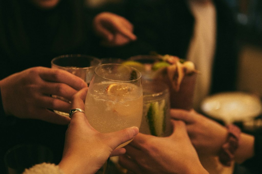 Five friends cheering on good news.