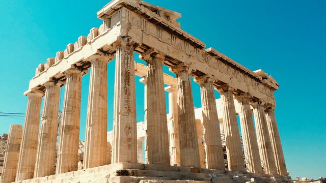 Impressive view of the ancient Parthenon in Athens against a clear blue sky