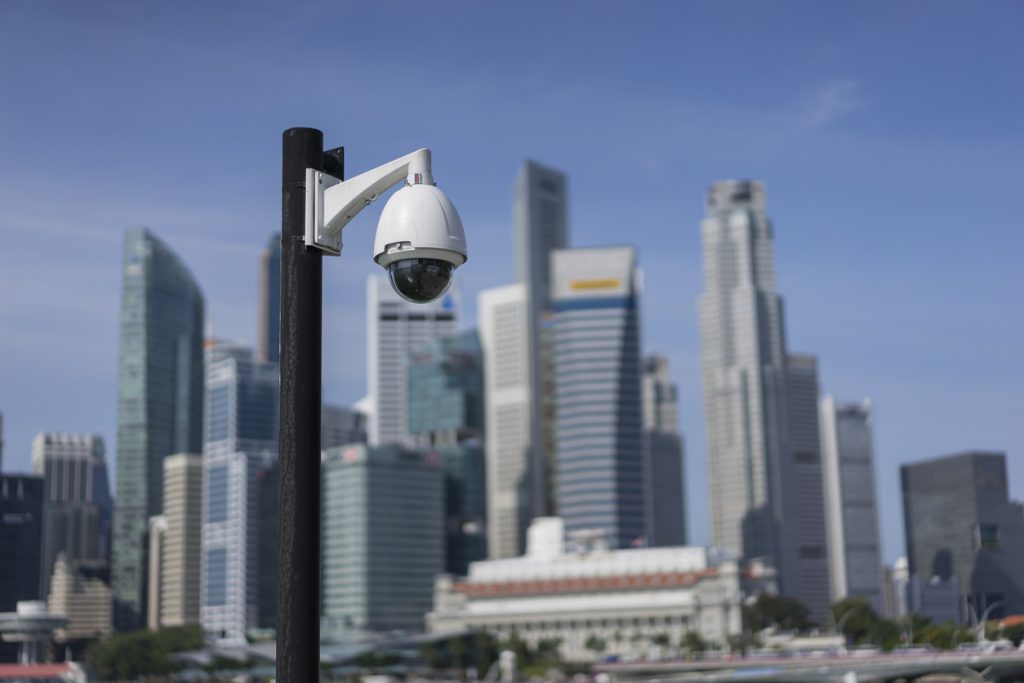 Surveillance camera overlooking the Singapore business district - rules to follow in Singapore