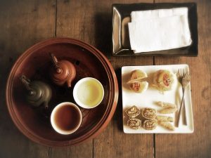 Tea and refreshments on a table - unusual things to do in Bangkok