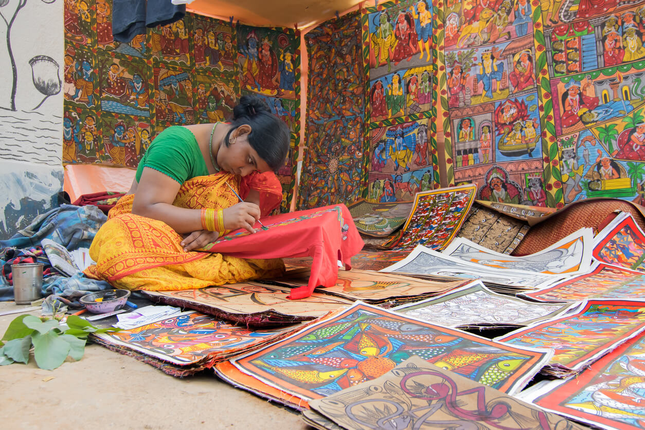 Colorful handicrafts being prepared for sale at Pingla village, West Bengal, India