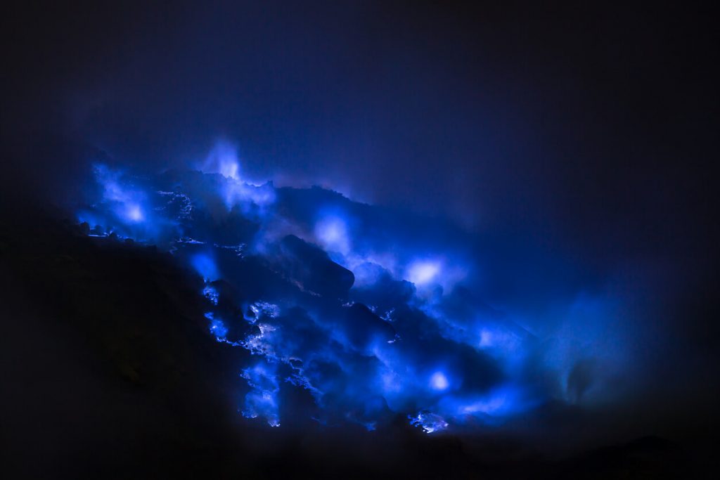 Kawah Ijen volcano spewing Blue sulfur flames, East Java