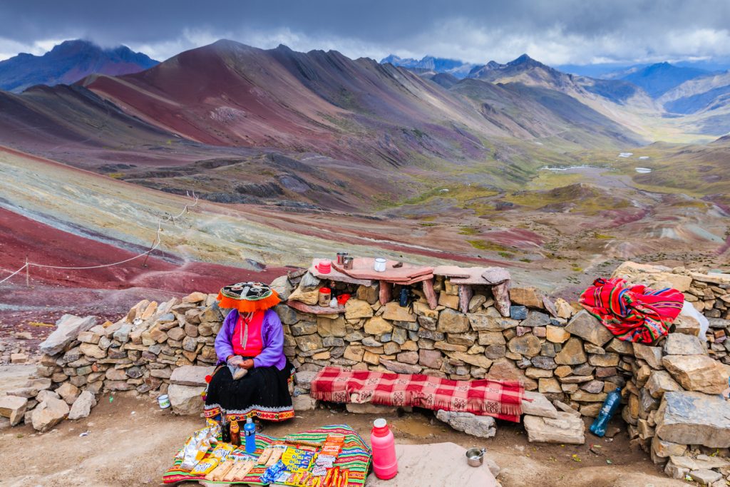 Locals selling souvenirs at rainbow mountain