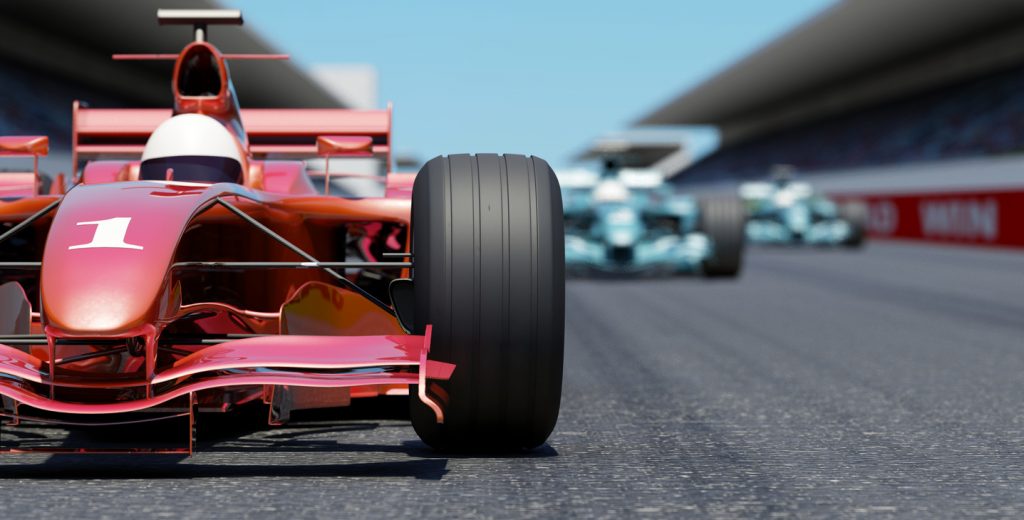 Close front view of a red race car on a track. High resolution 3D render. best clubs in Bahrain