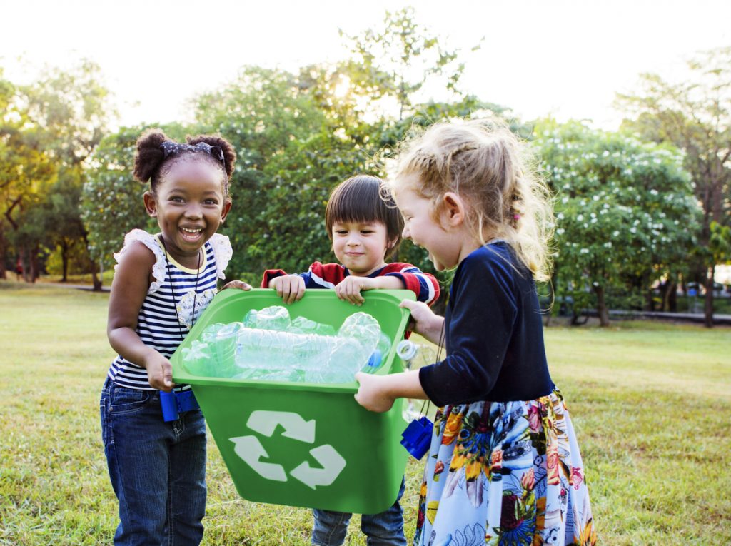 Group of kids volunteer to pick waste, volunteer tourism