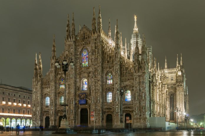 Night view of Piazza del Duomo square with Duomo cathedral, one of the biggest gothic-style structures in the world, Milan, Lombardy, Italy, Game