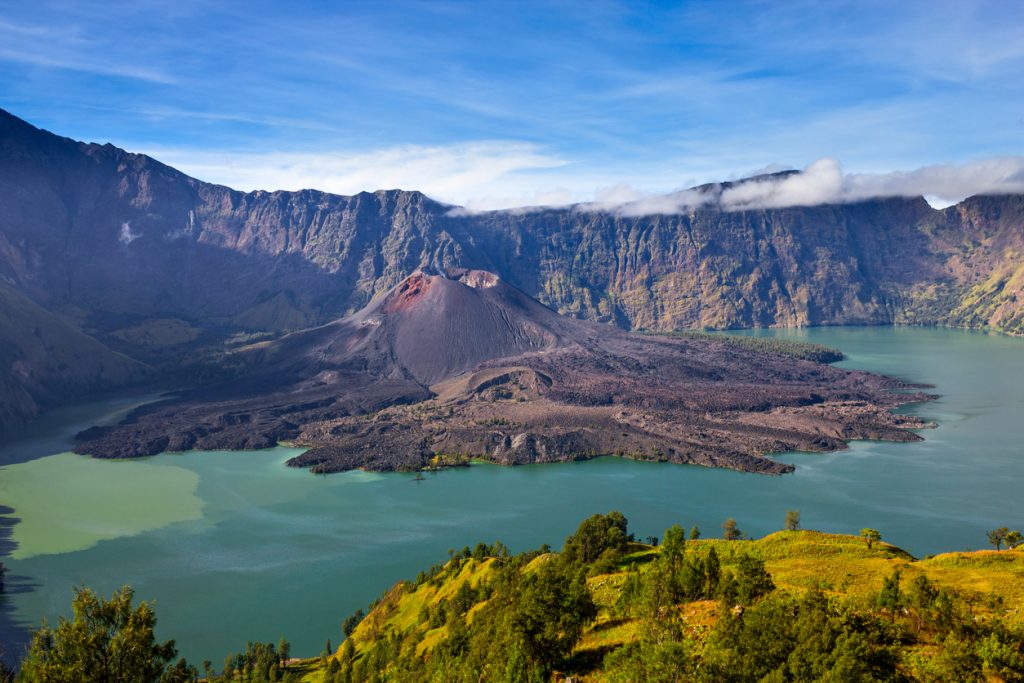 places to visit in lombok, The caldera of Mount Rinjani with the crater lake Segara Anak and the volcanic cone Gunung Baru