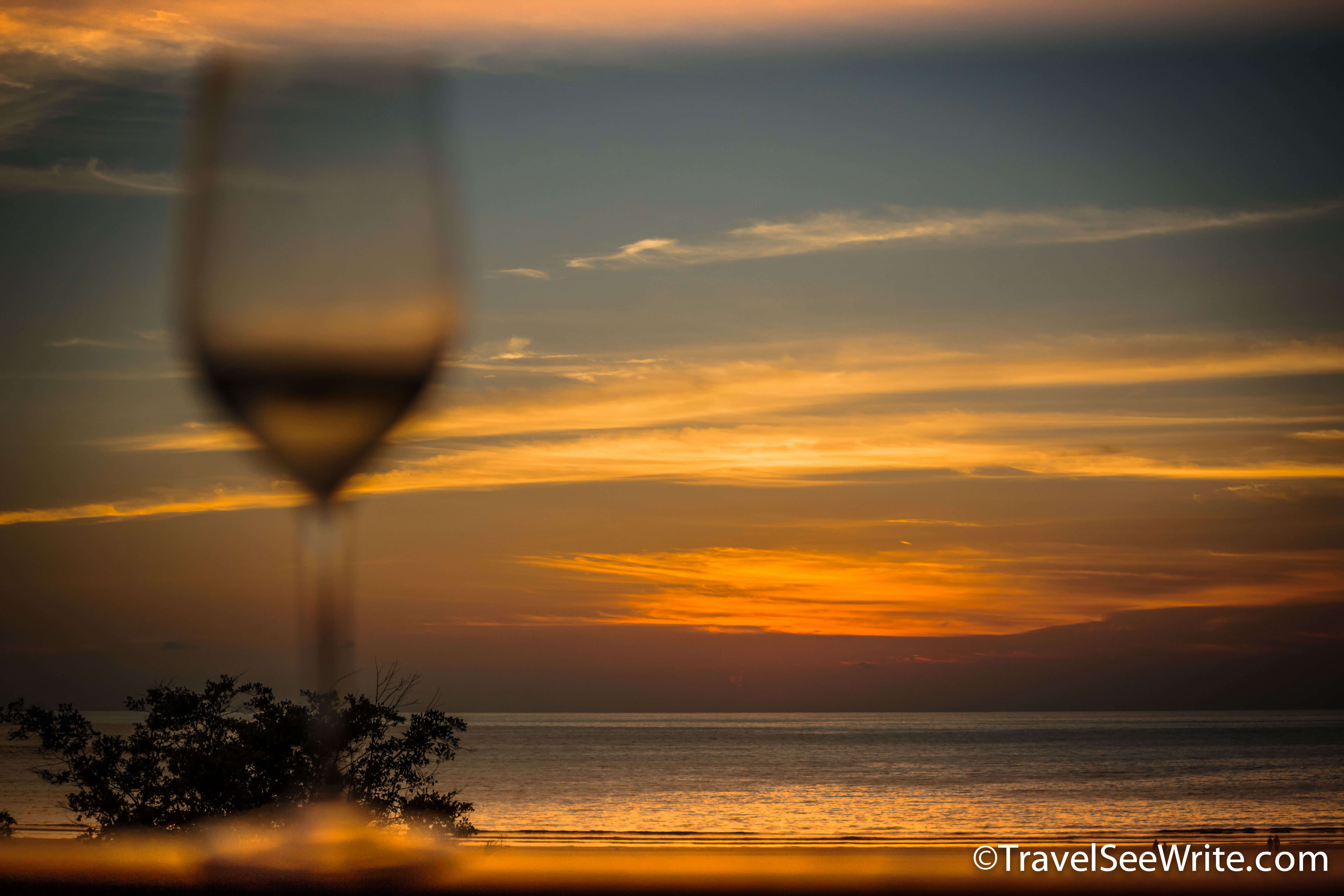 Sunset viewed from the balcony at Shangri La's Rasa Ria Resort - southeast asia travel