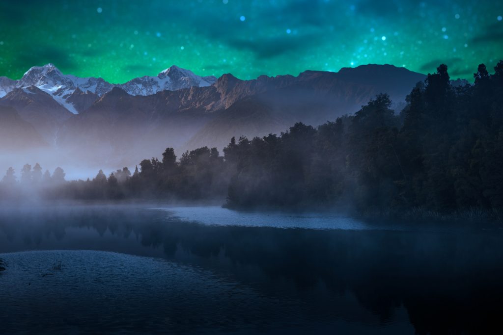 Mount Cook and Mount Tasman reflected in Lake Matheson at Sunset. New Zealand- peaceful places