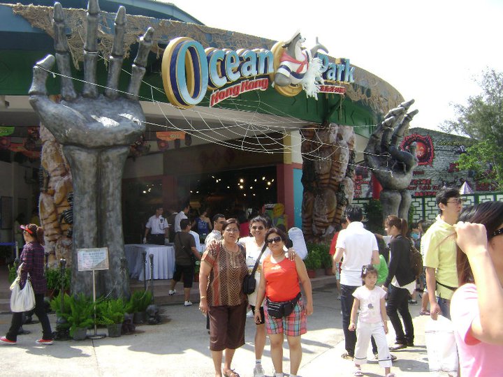 People standing in front of ocean Park in Hong Kong - explore Hong Kong