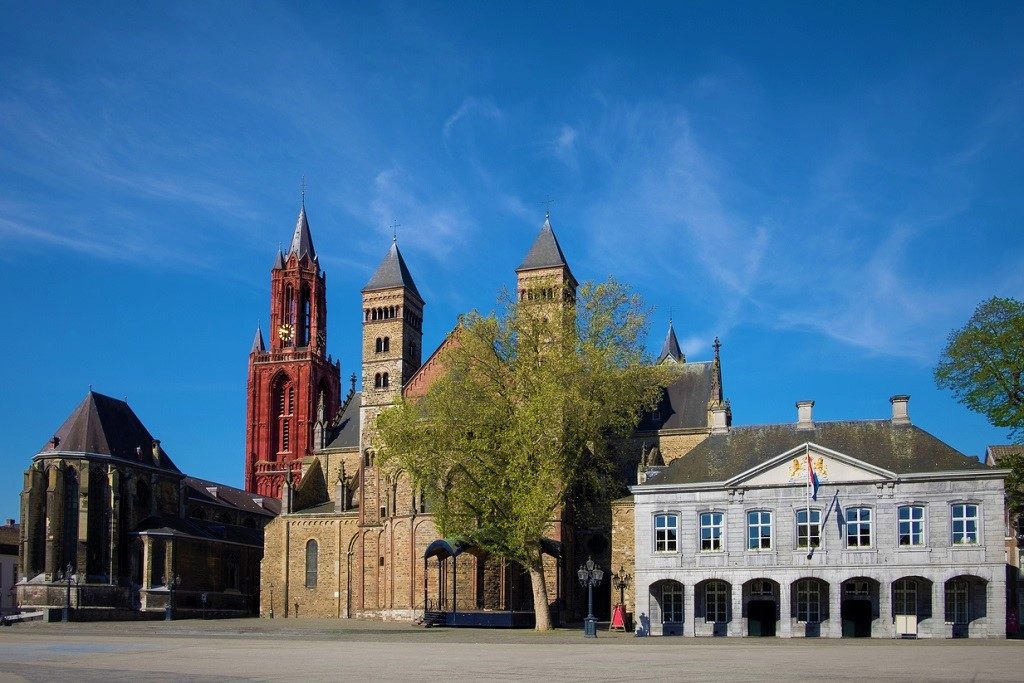 Saint Servatius Basilica and Saint John's church and the Military Guard House at the Vrijthof Square in the city of Maastricht in The Netherlands. Underrated cities in Europe