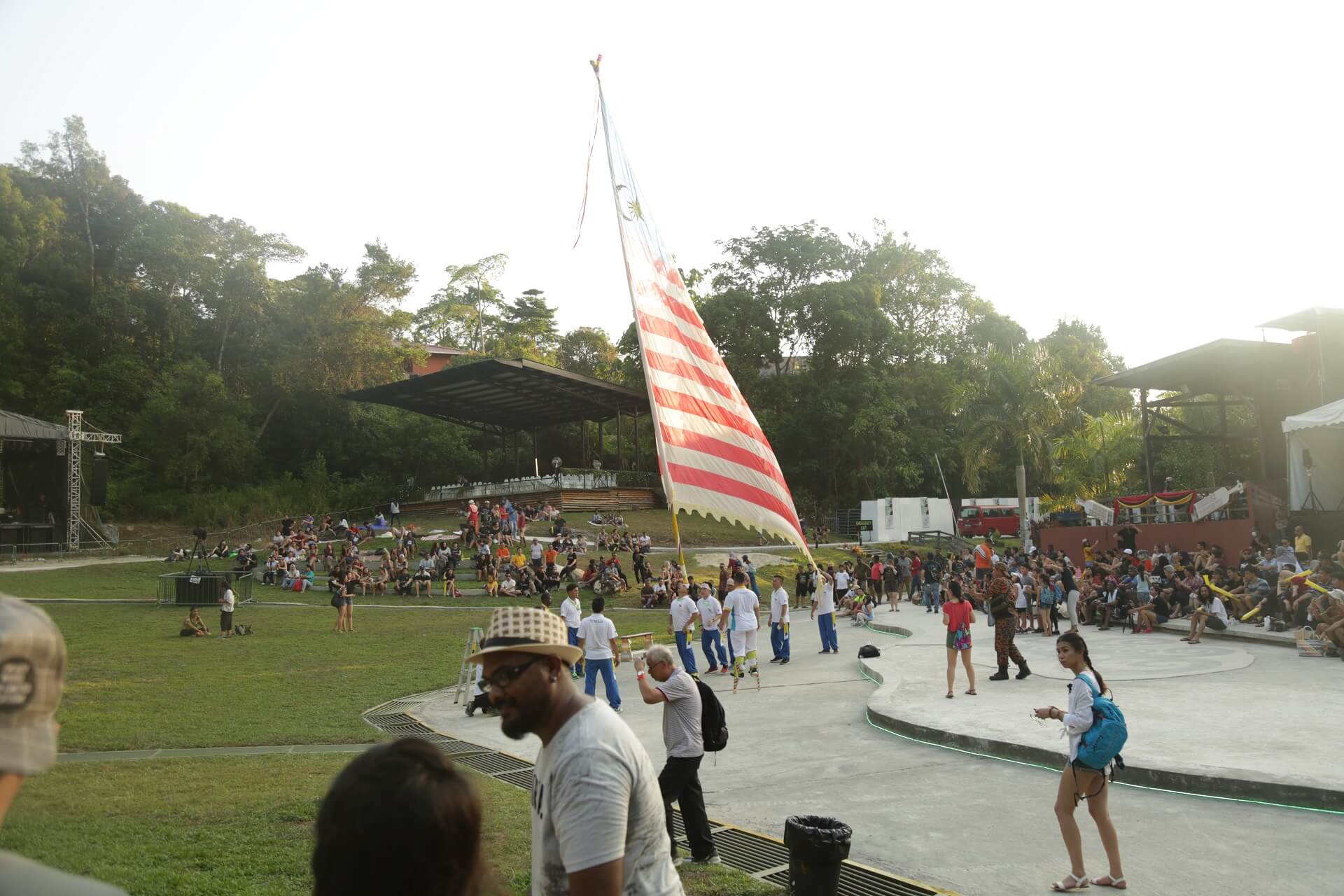 People balancing a flag several metres high - Rainforest World Music Festival (RWMF) 2018