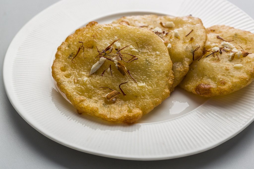 Malpua is a pancake served as a dessert or a snack originating from the Indian subcontinent, popular in India.