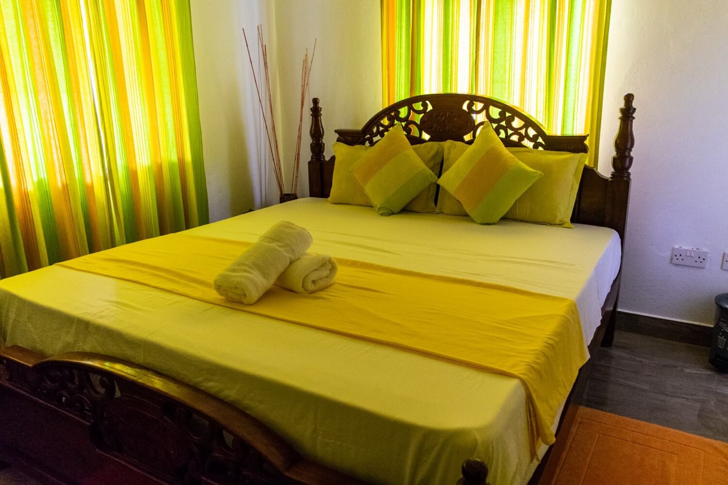 A bed in a Self Catering Apartment - budget guide to Seychelles