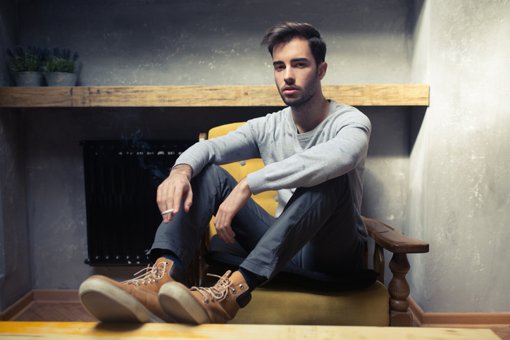 Man wearing chinos as travel outfits for men