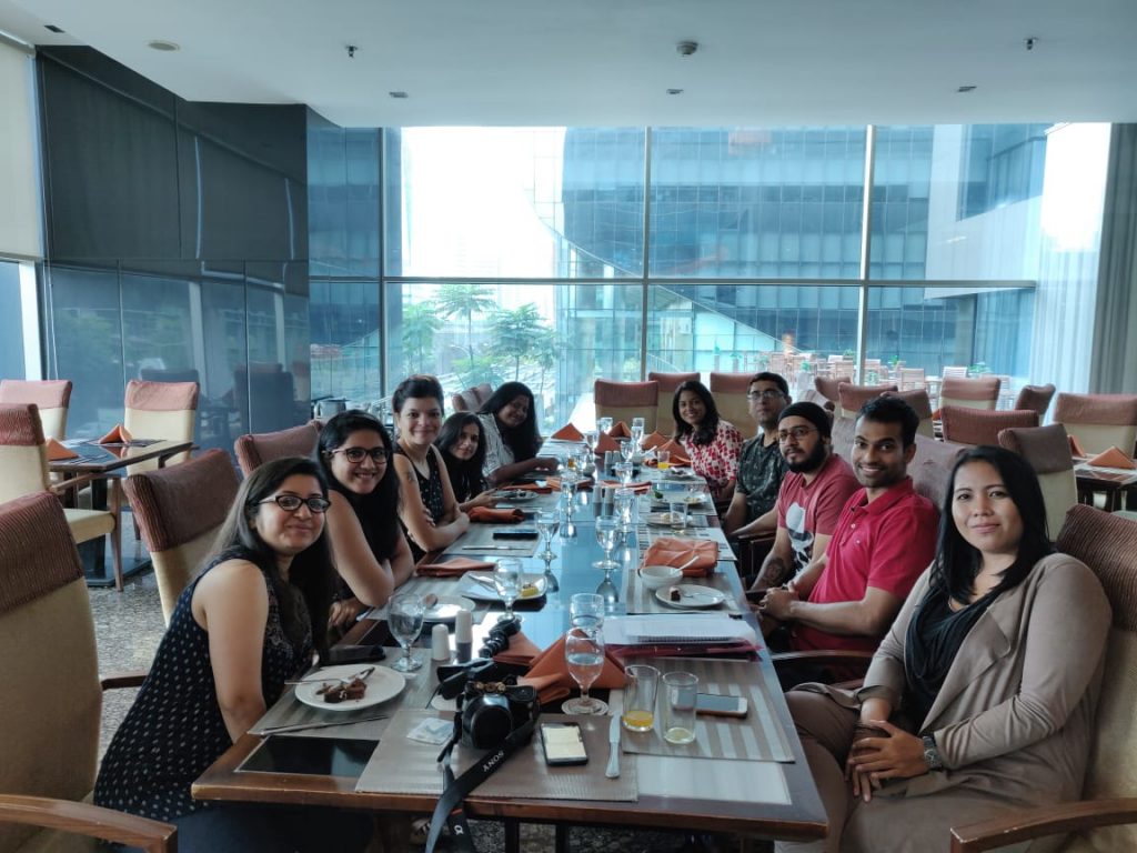 A group of people around a table