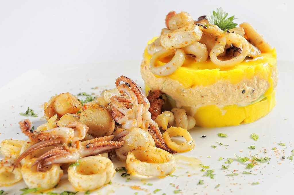 Causa stuffed with seafood, a typical dish of Peru.