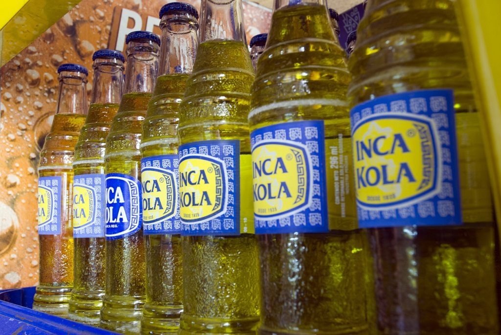Lima, Peru - February 22th, 2011: Bottles of Inca Kola, a peruvian soft drink. It is a sweet and fruity flavored soda, sometimes compared to liquid bubblegum.