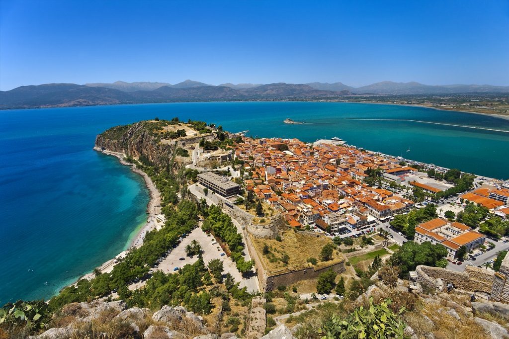 Greece. Nafplio. Aerial view of the old part of the city from Palamidi castle. There is Bourtzi Castle in background