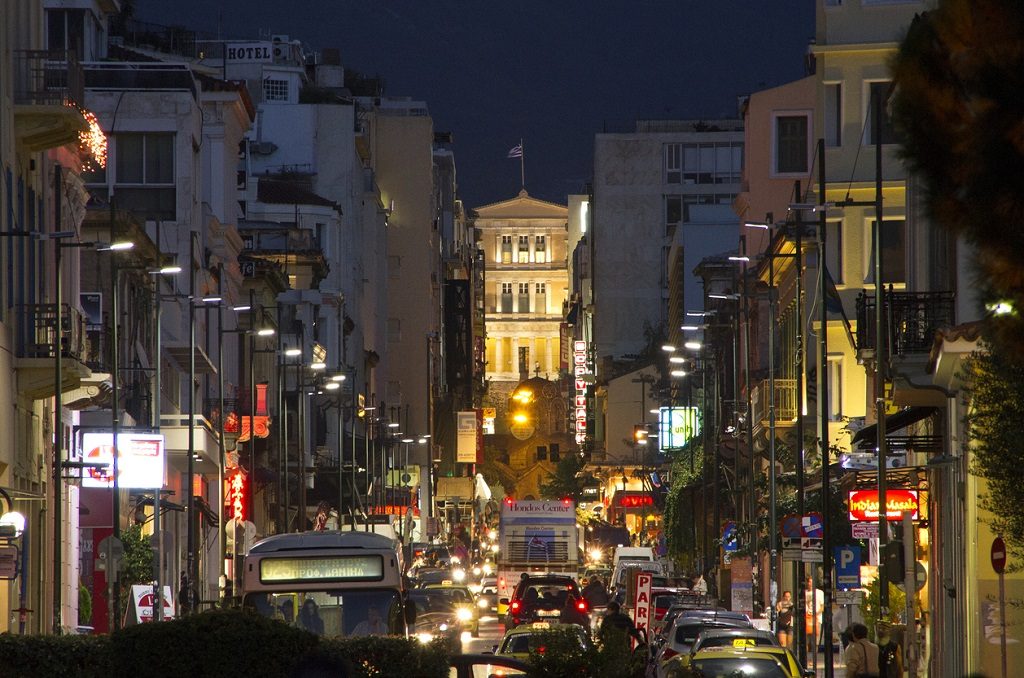 Traffic jam in Athens, Greece, with the Greek Parliament on the backround