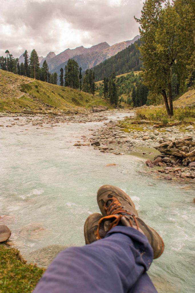 Relaxing by the stream on a Chadar Trek