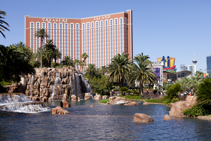 Treasure Island Hotel and Casino Las Vegas, Nevada with the lake at the Mirage in the foreground and the Fashon Show Mall and Stratosphere tower in the background