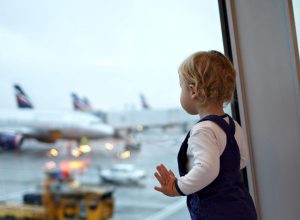 Baby waiting to board a flight