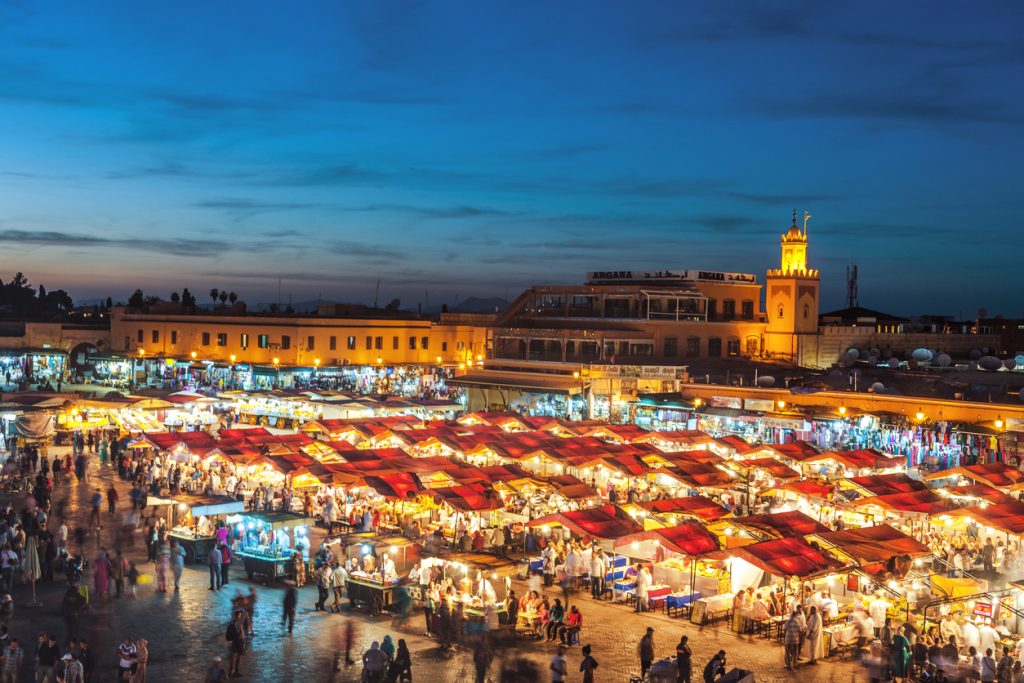 Evening Djemaa El Fna Square with Koutoubia Mosque, Marrakech, Morocco