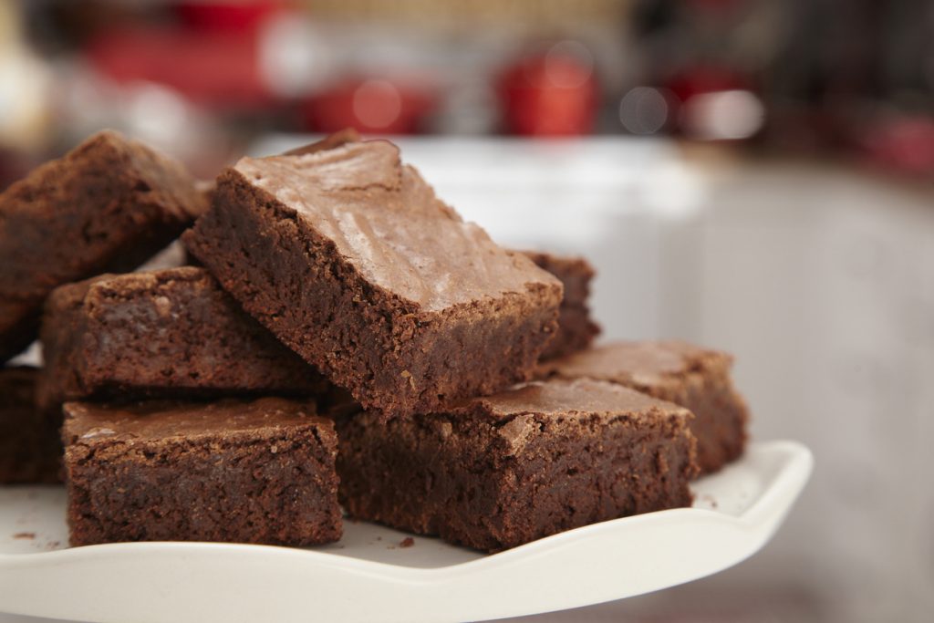 A batch of chocolate brownies on a plate