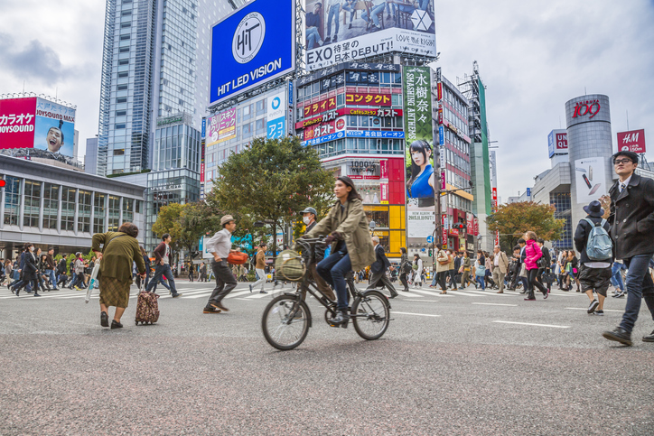 Shibuya crossing, pedestrians and cyclist crossing the road, street level, Game, Zodiac Signs