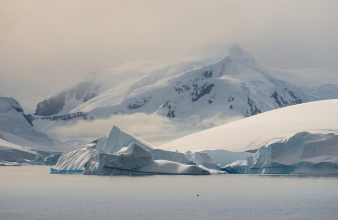 This photograph was taken in Gerlache Strait with full frame camera and G telephoto lens.