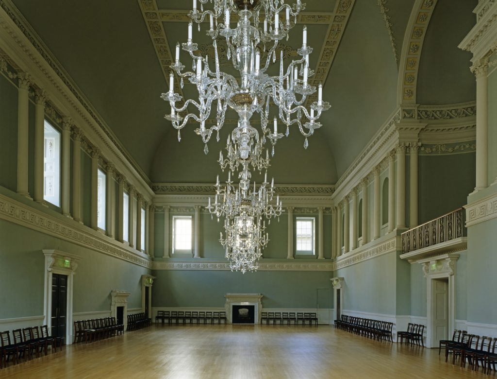 massive chandelier in the middle of assembly room
