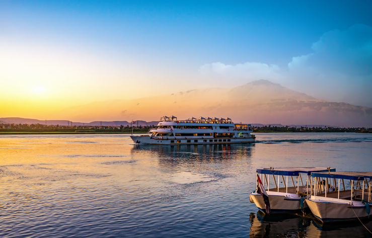 River Nile and ship at sunset in Aswan,