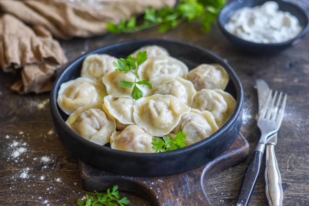 crescent-shaped Russian dumplings of Siberian origin. 