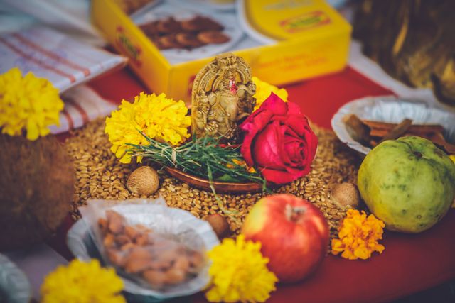 offering with flowers, fruits, and grains, symbolizing traditional culture.