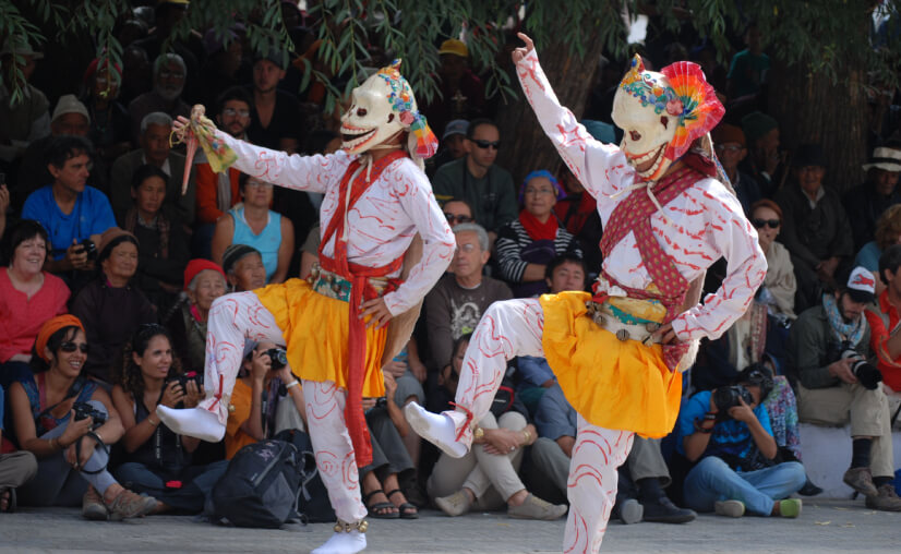 Two monks chosen to be oracles performing astounding feats. 