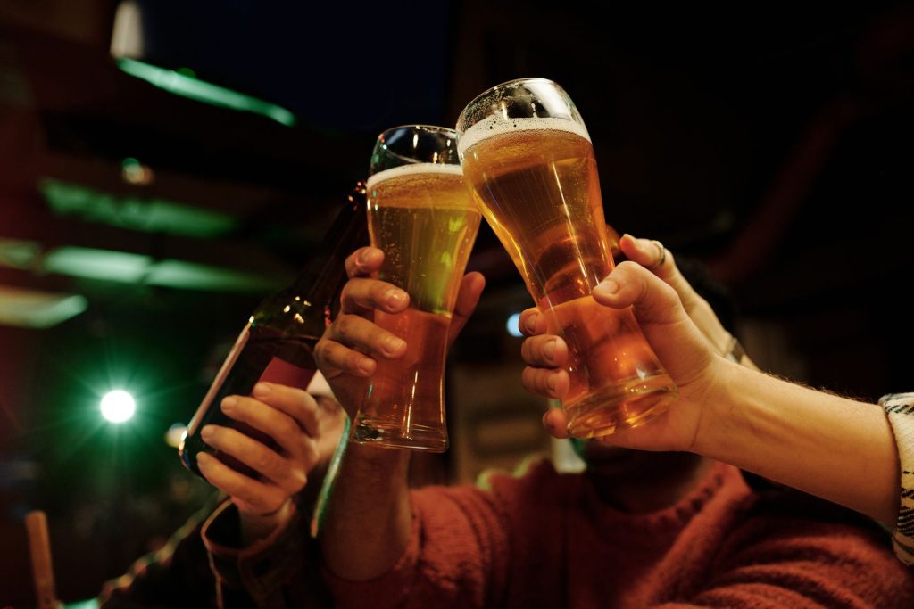 friends toasting glasses of beer