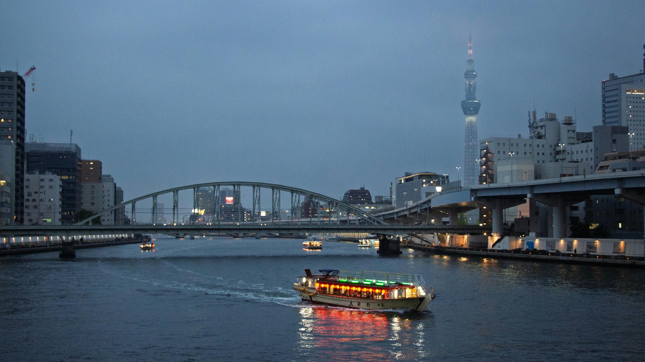 Sumida River boat well lit during the night cruise