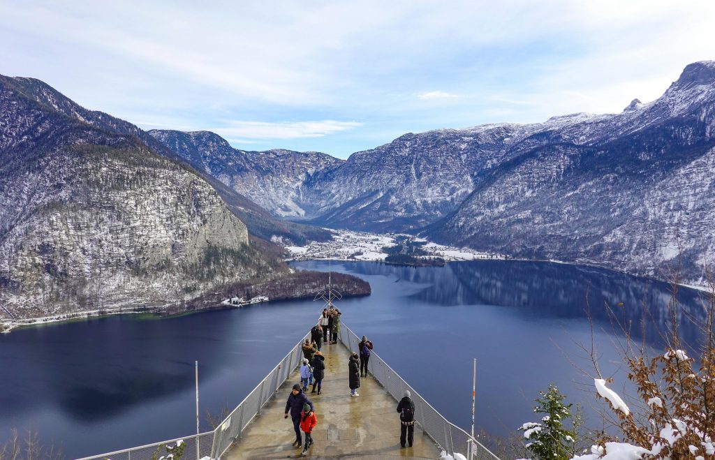 Tourists standing 350 meters above the beautiful town.