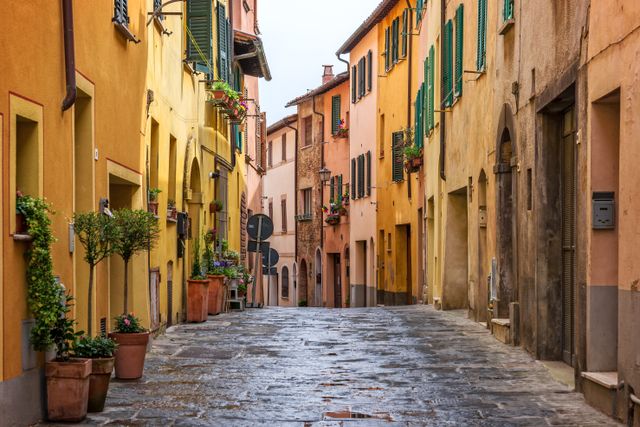 Picturesque alley with colorful buildings in Tuscany. 